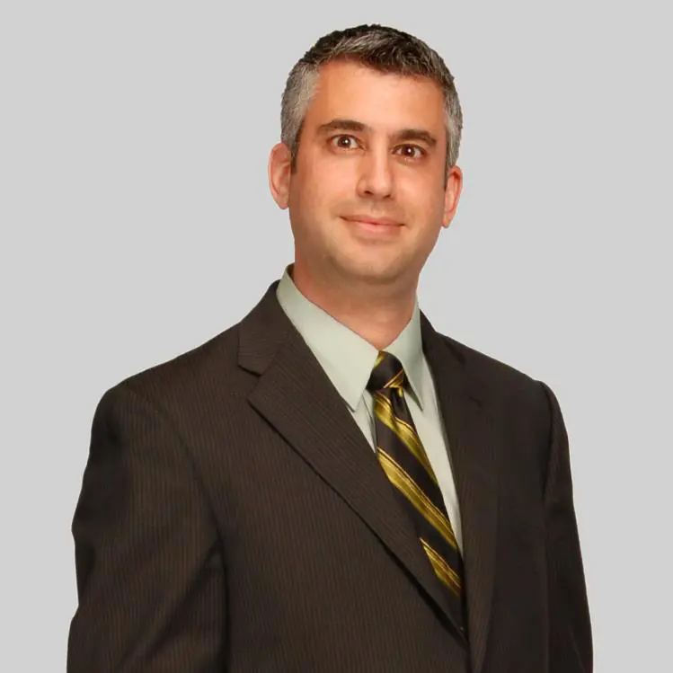 Adam M. Grenker
